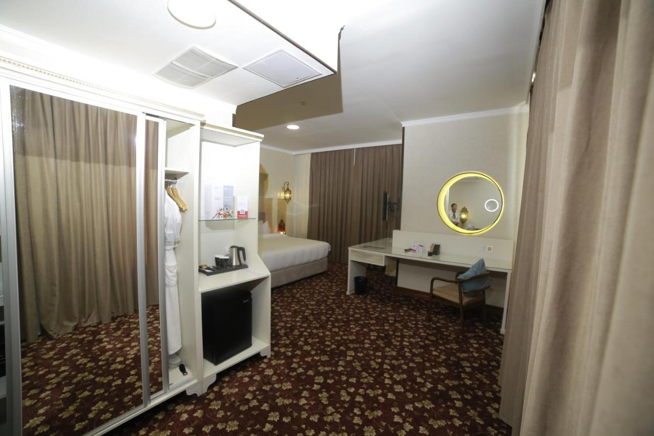 Jannat Regency Jalal-Abad Hotel Exterior foto